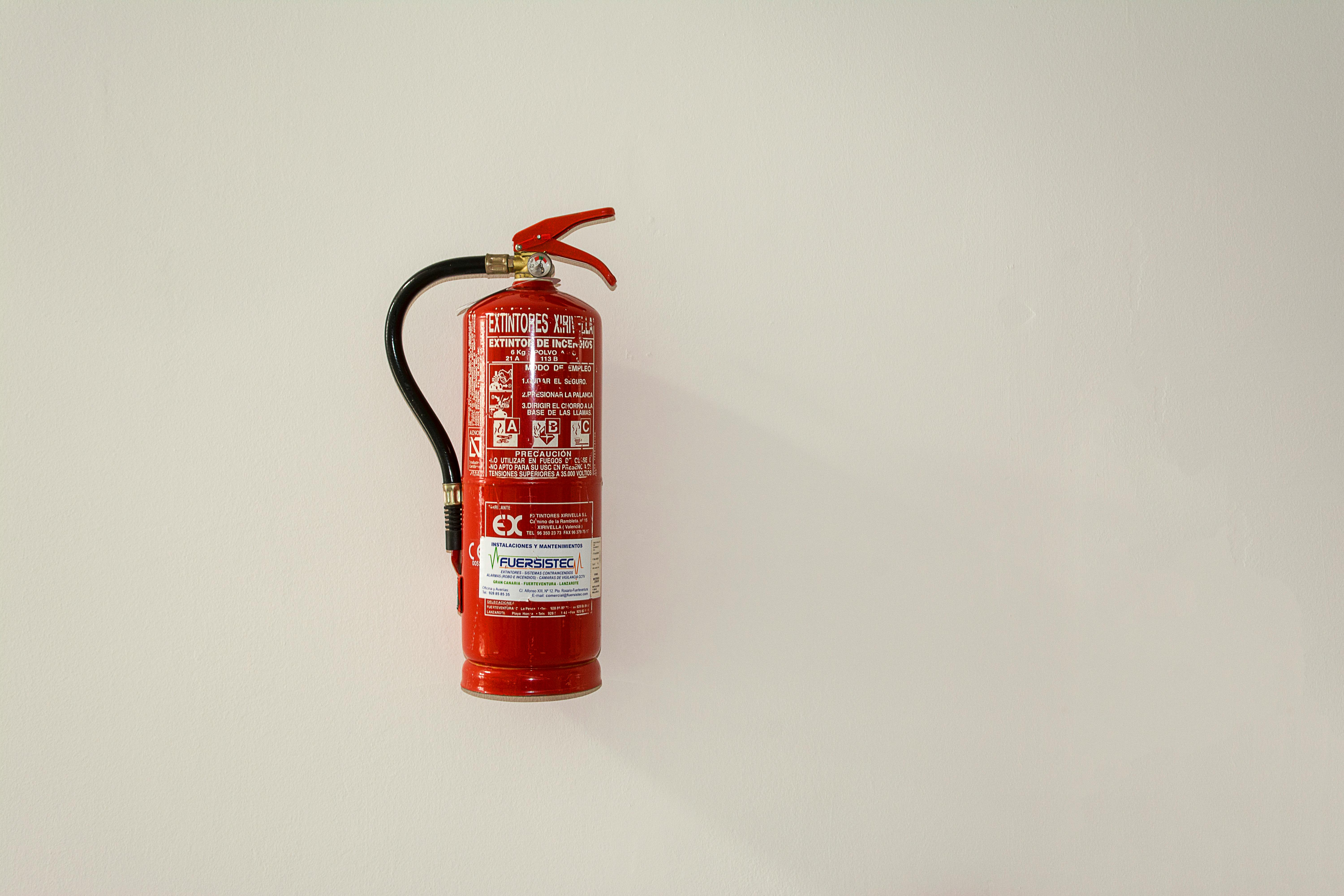 Properly mounted CO2 fire extinguisher with clear labeling - carbon dioxide fire extinguisher label