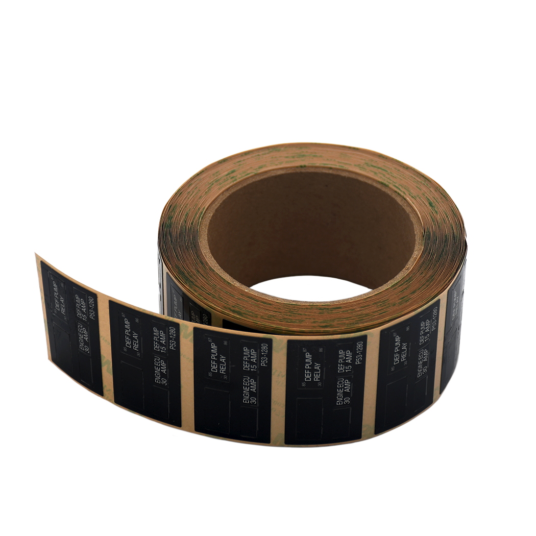 roll-fed destructible labels on industrial applicator equipment - custom destructible labels